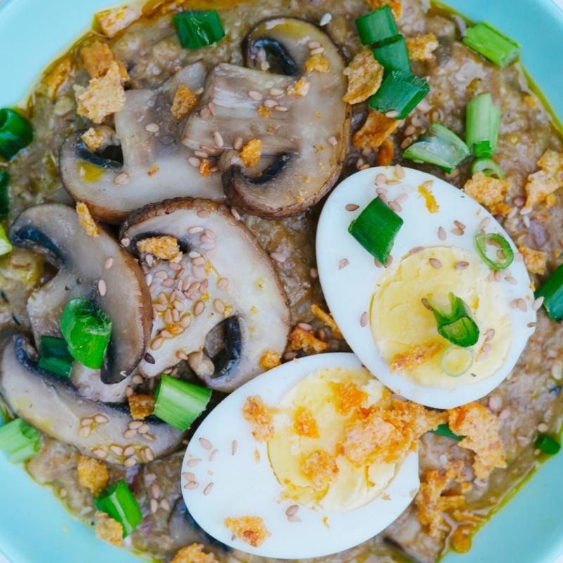 A image of a dish that contains eggs, mushrooms and leek.